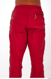 Nabil dressed red athletic track pants sports thigh 0005.jpg